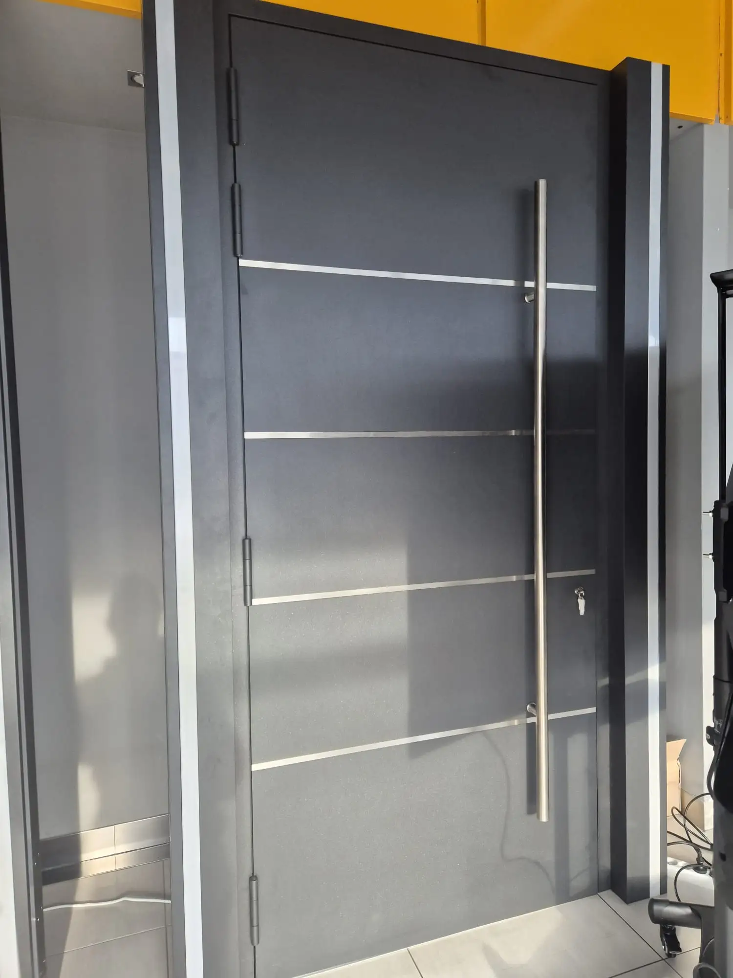 Aktuální fotografie vchodových dveří